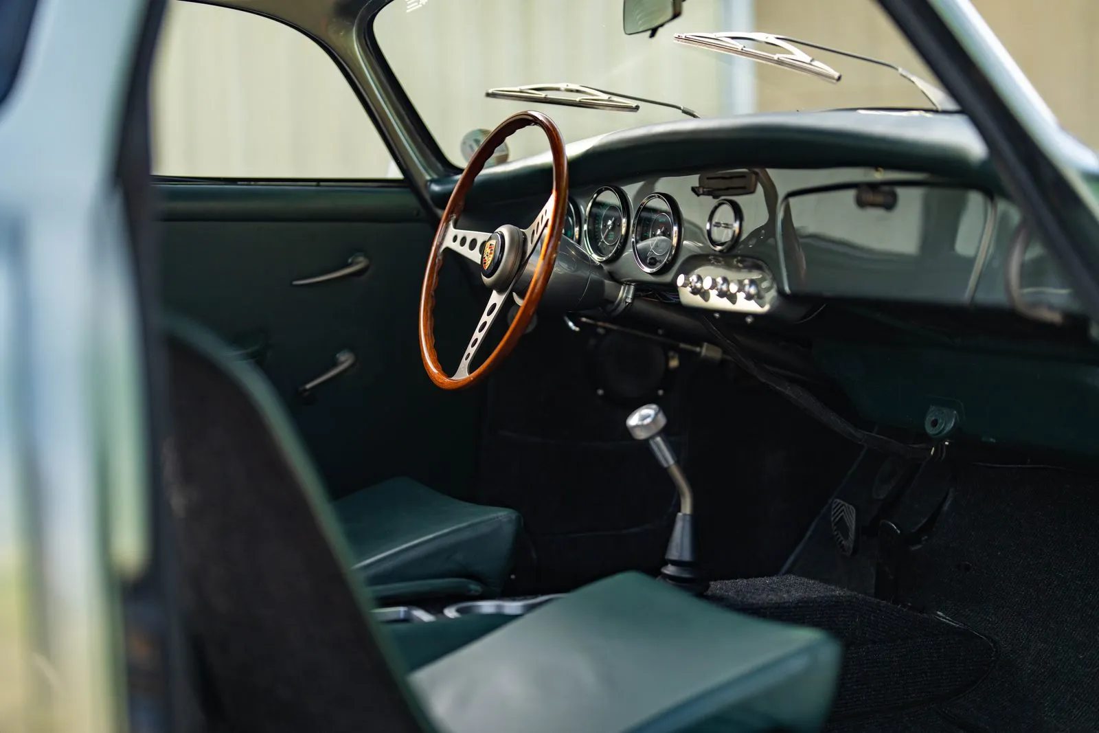 The full-leather interior with VDO gauges and donated wheel
